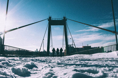 Suspension bridge against sky
