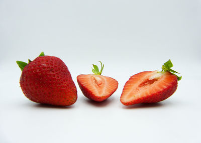 Close-up of fruits against white background