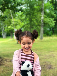 Portrait of smiling girl in park