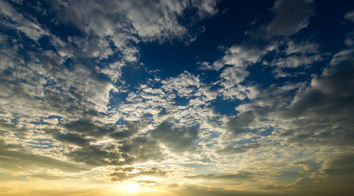 Low angle view of clouds in sky during sunset