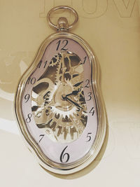 Close-up of clock on wall