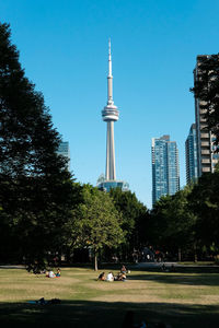 View of buildings in city against clear sky