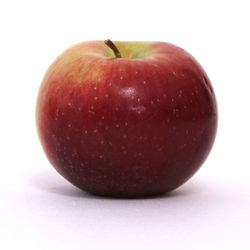 Close-up of apple against white background