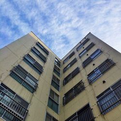 Low angle view of modern building against sky