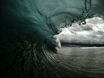 Close-up of sea waves against sky