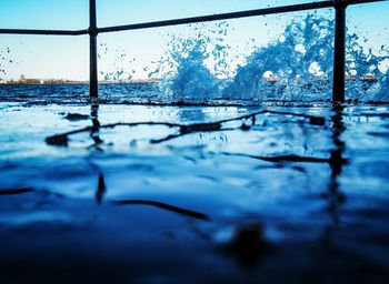 Close-up of water drops on ground