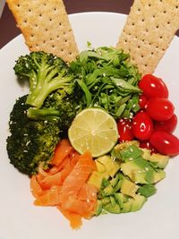 High angle view of chopped fruits in plate