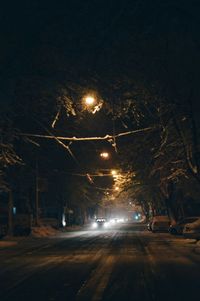 Illuminated street light at night