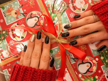 Close-up of woman holding hands