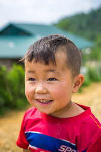 Portrait of cute boy smiling