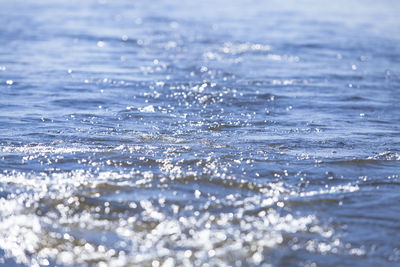 Close-up of sea waves splashing on shore