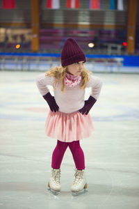 Full length of girl ice-skating