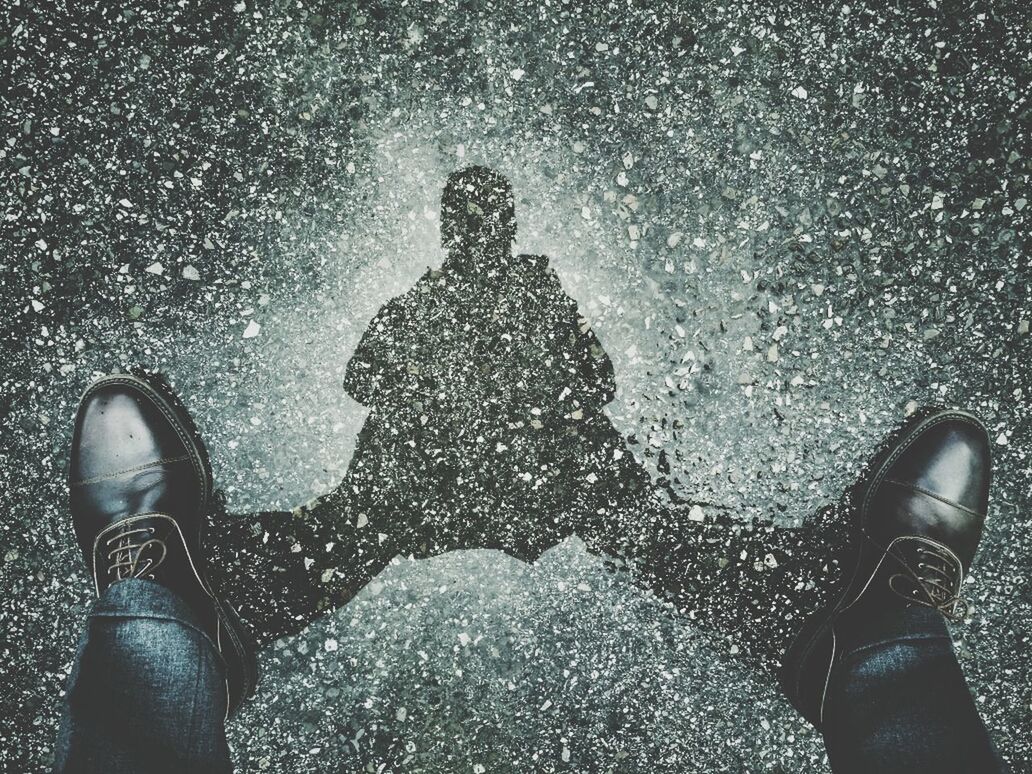 low section, person, lifestyles, personal perspective, shoe, leisure activity, men, standing, human foot, unrecognizable person, high angle view, water, part of, wet, puddle, street, footwear