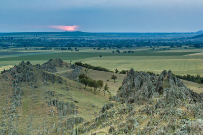 Scenic view of land against sky