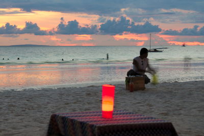 Scenic view of sea at sunset