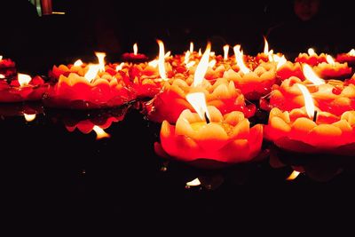 Close-up of multi colored candles