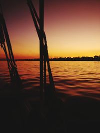 Scenic view of sea against orange sky