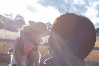 Close-up of woman with dog