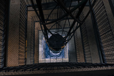 Low angle view of sculpture on building roof