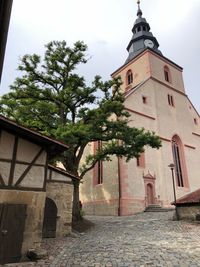 Exterior of historic building against sky