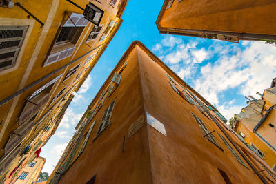 Low angle view of residential buildings against sky