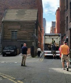 Woman standing in front of building