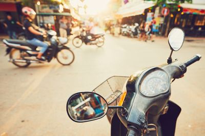 Close-up of motorcycle on road