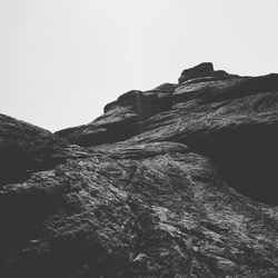 Low angle view of mountain against clear sky