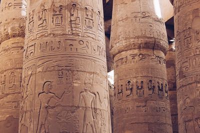 Low angle view of hieroglyphics on columns