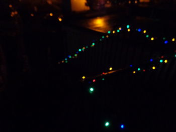 Close-up of illuminated lights at night