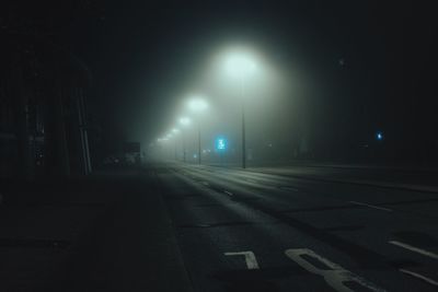 View of illuminated street at night