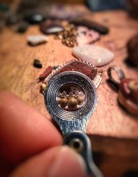 High angle view of person working on metal