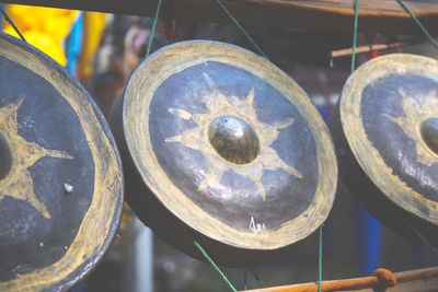 Close-up of old metal hanging at market stall