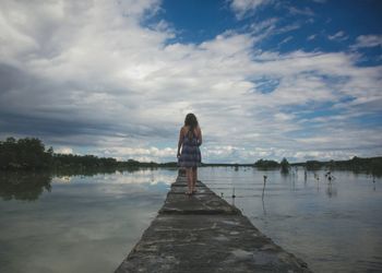 Scenic view of sea against cloudy sky