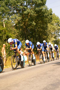 People riding bicycle