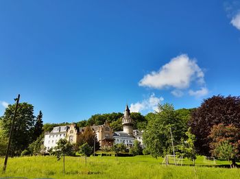 View of temple against clear blue sky