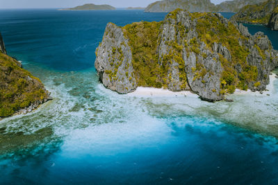 High angle view of rocks in sea