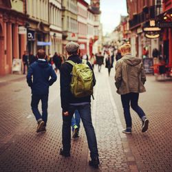 Woman standing on city street