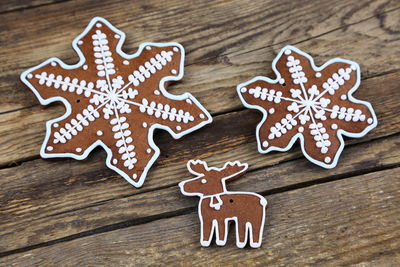 Close-up of gingerbread cookies on wooden table