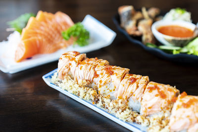 Close-up of sushi served on table