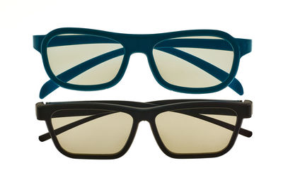 Close-up of sunglasses against white background