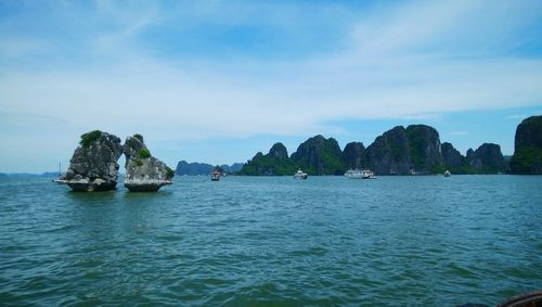 Scenic view of bay against sky