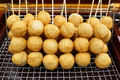 High angle view of fried food on cooling rack