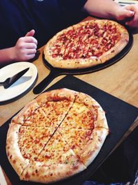 Cropped hand holding coffee