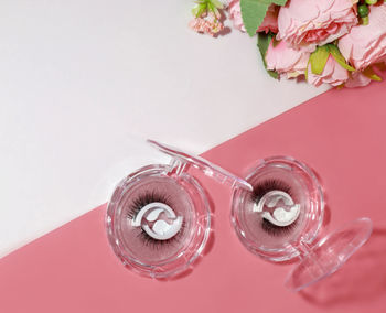 Close-up of wedding rings on table