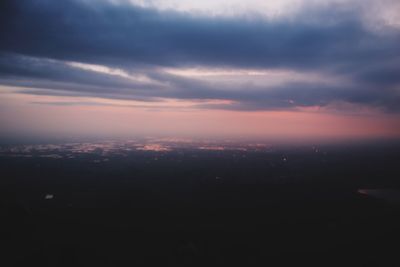 Aerial view of city during sunset