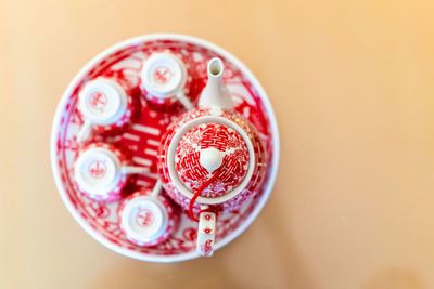 High angle view of pink candies on table