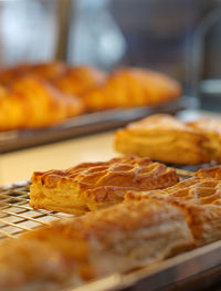 Close-up of breads at bakery for sale