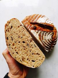 Close-up of hand holding bread