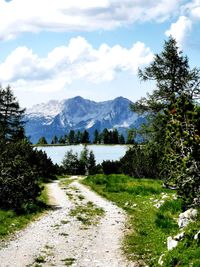 Scenic view of landscape and mountains against sky
